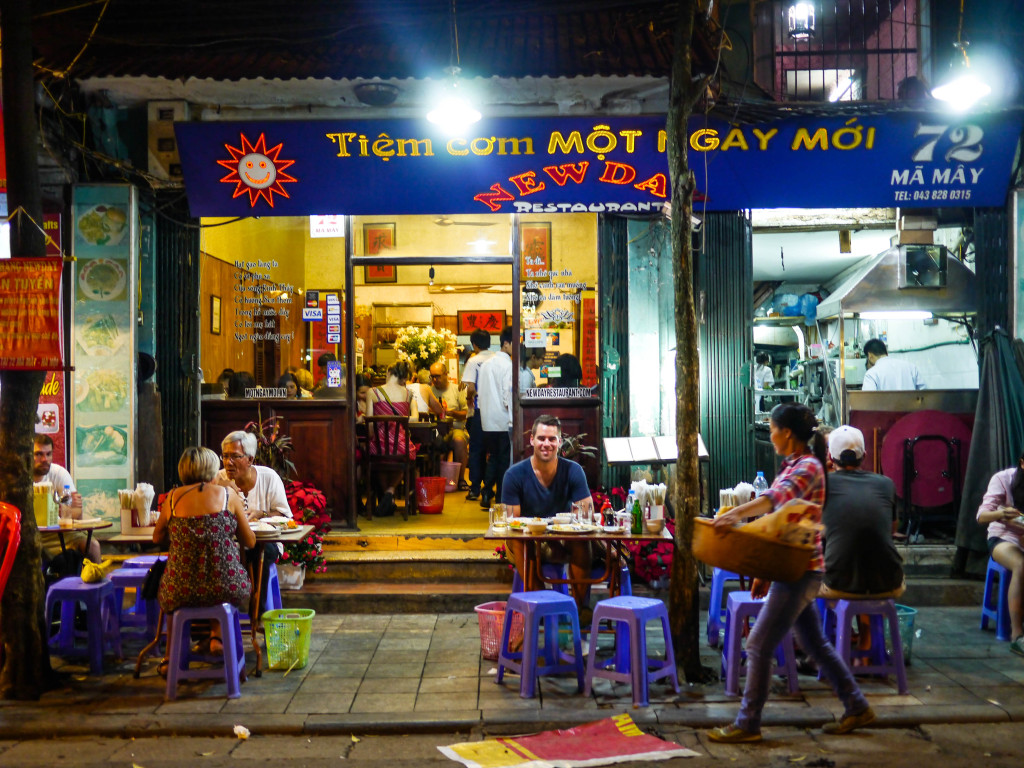 eating on stools in vietnam